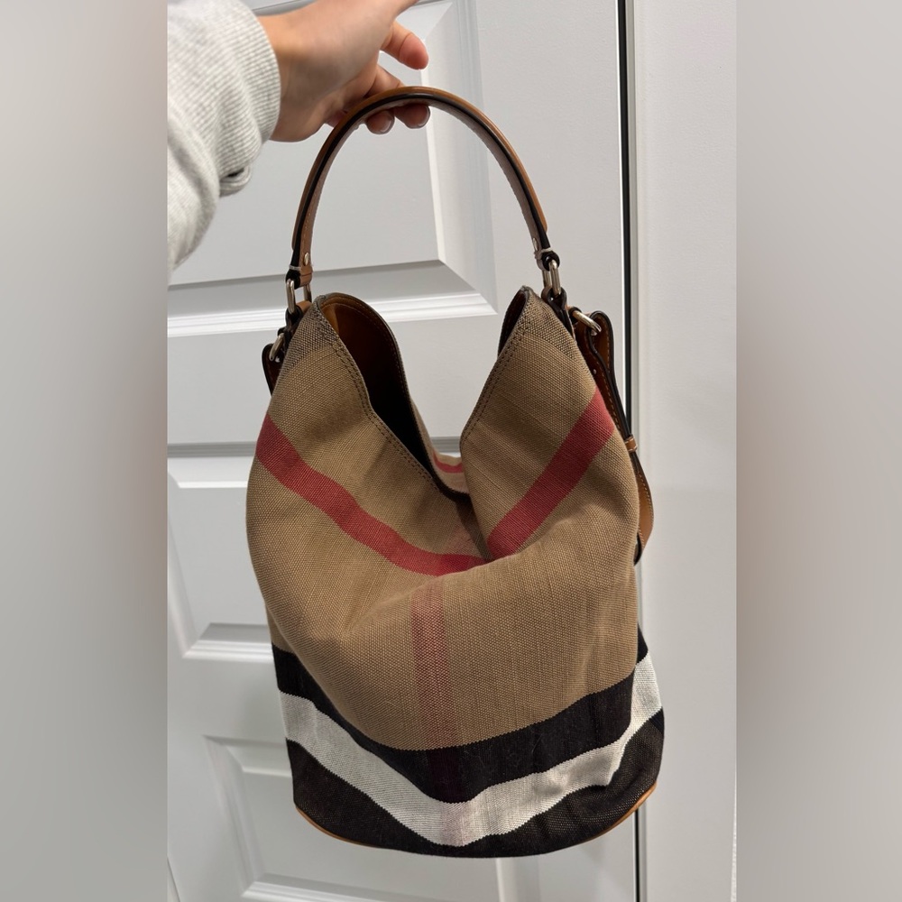 Burberry Bucket Bag with Top Handle and Crossbody strap.